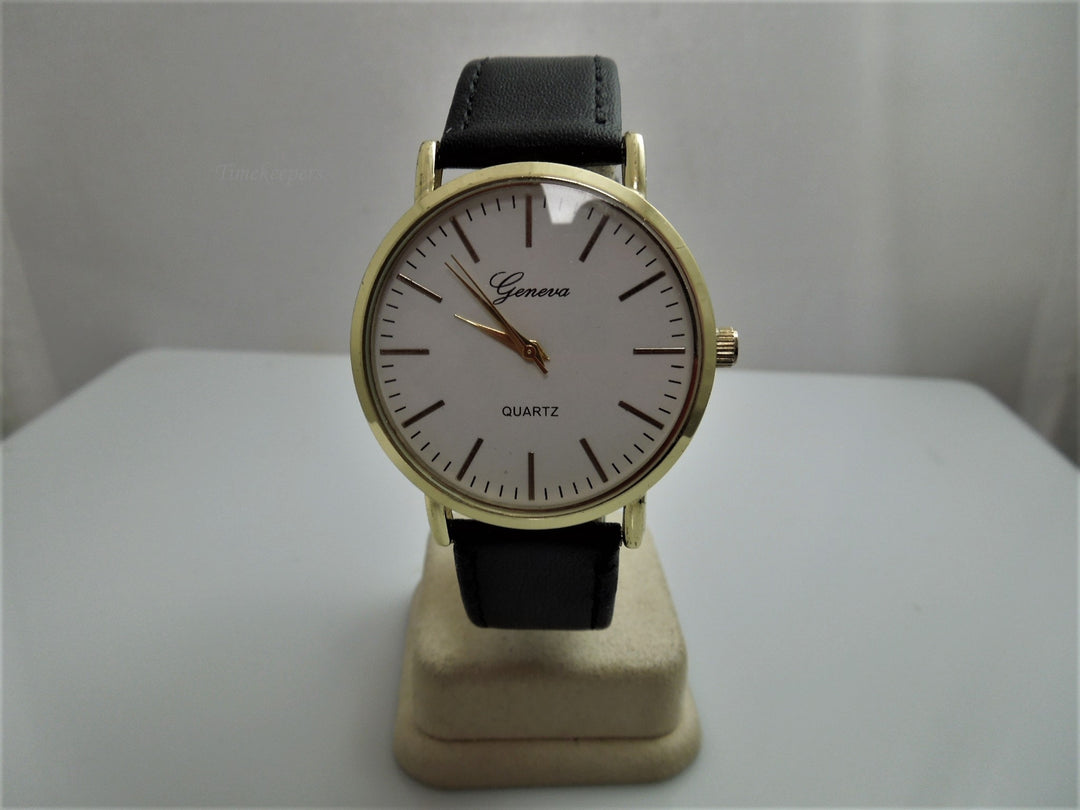 h671 Handsome Geneva Quartz Water Resistant Watch Gold Tone with Stainless Back
