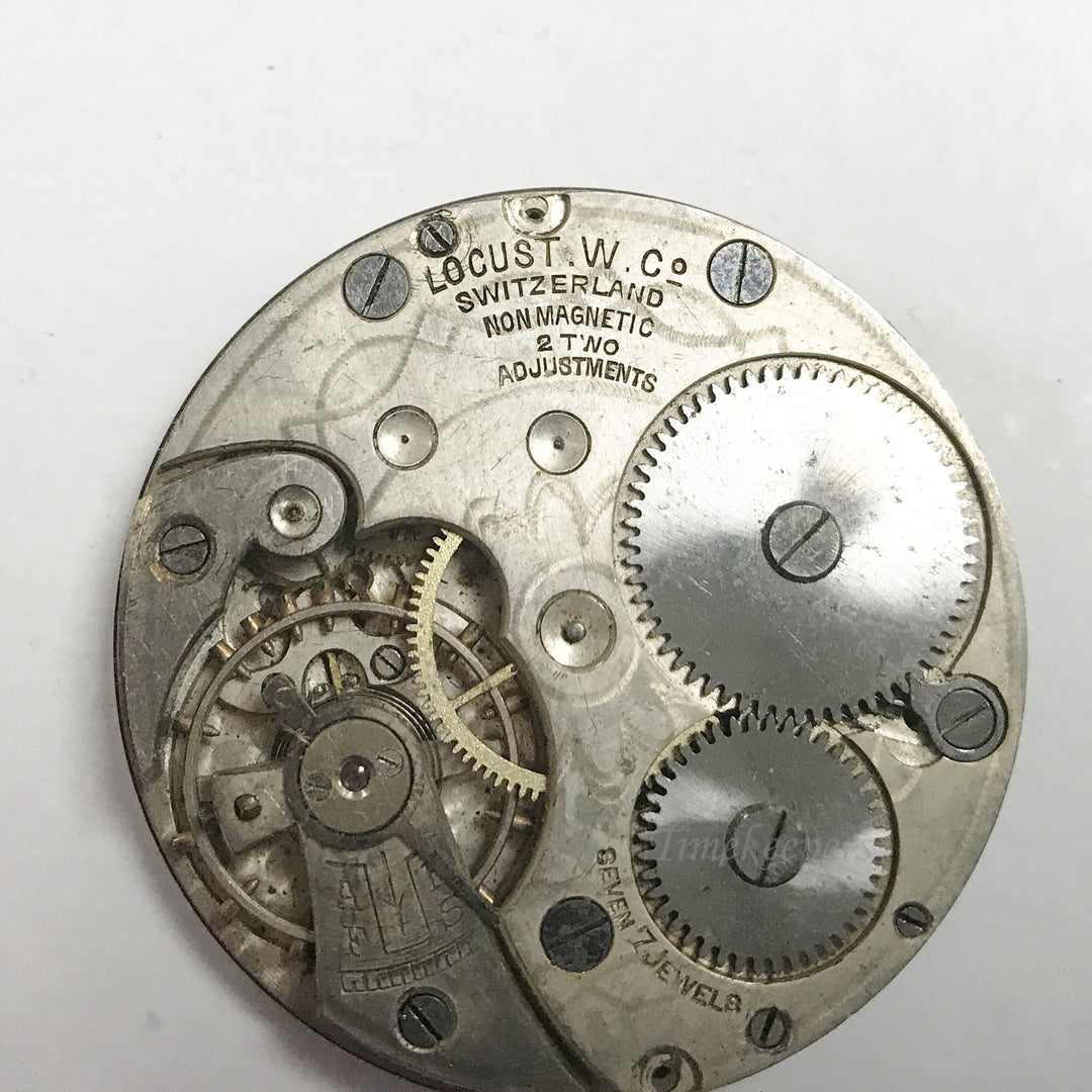 e886 Antique Locust Switzerland Pocket Watch Movement 7J for Parts or Repair