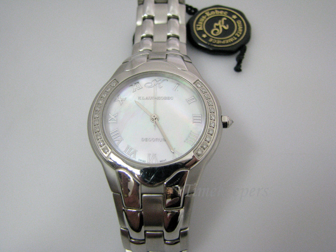 c620 Elegant and Handsome Klaus Kobec Quartz Timepiece with Mother of Pearl Dial
