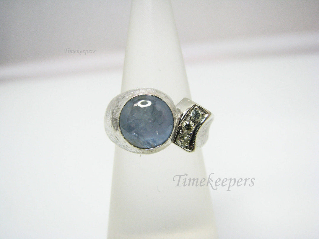 c594 Handsome 14k White Gold Light Blue Stone and Diamond Ring