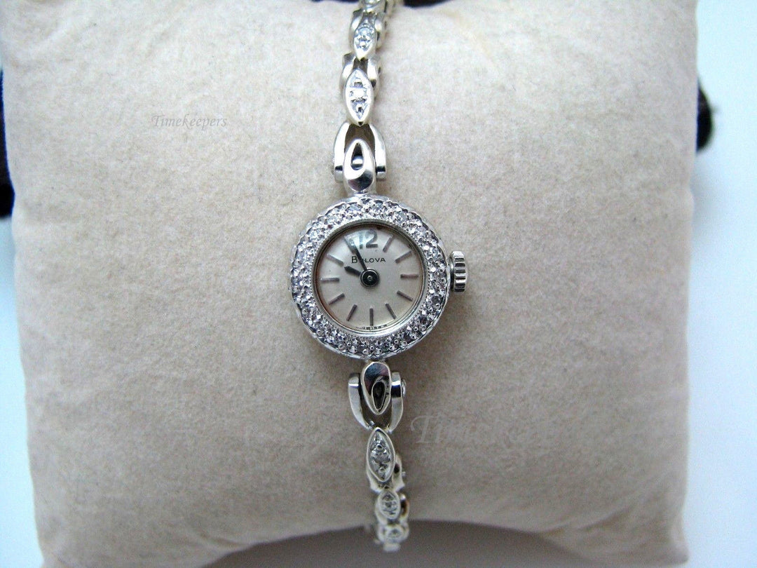 c025 1968 Bulova 14 karat Gold and Diamond Ladys Watch