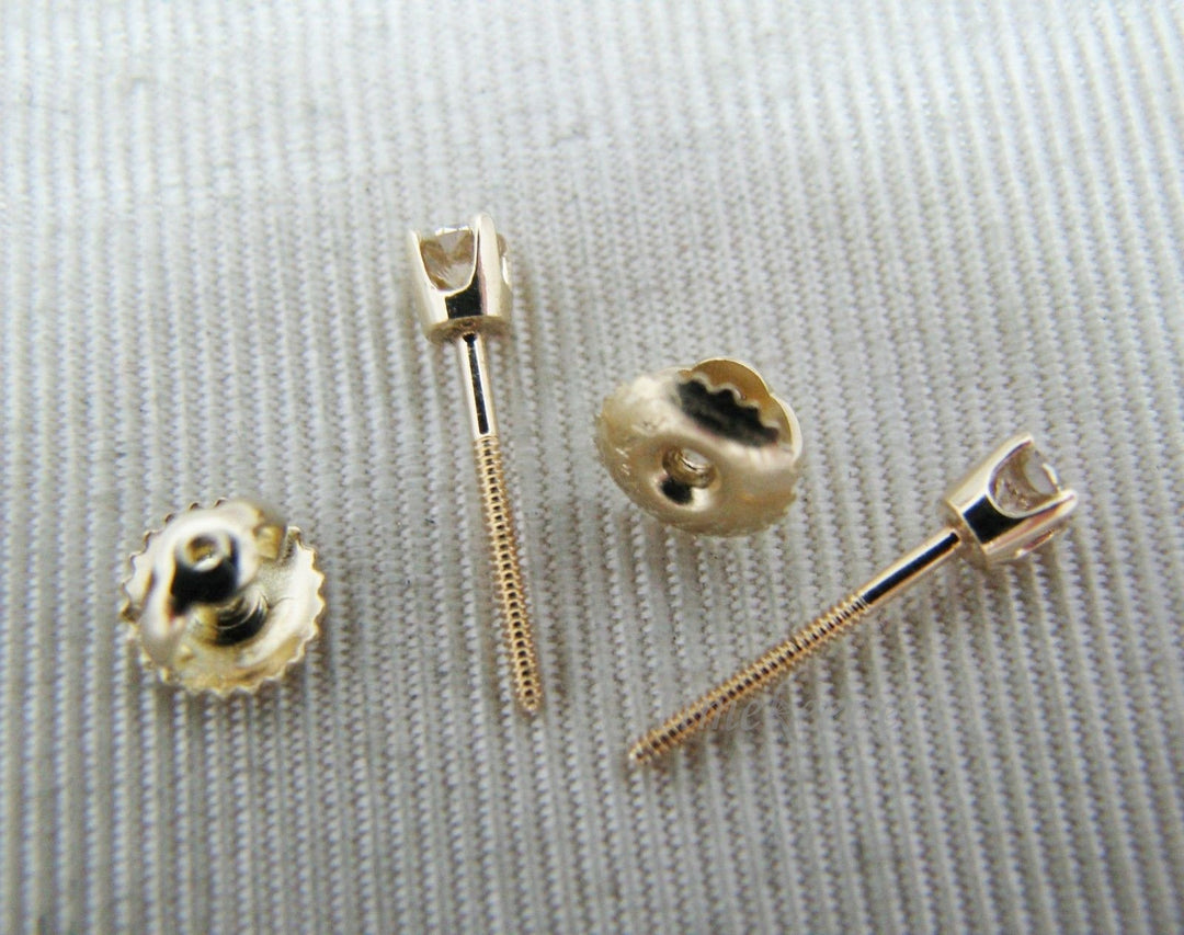 b036 Pretty .20 Carat Diamond Stud Pierced Earrings in 14k Yellow Gold