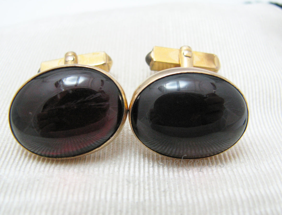 a445 Vintage Oval Cuff links with a Dark Red Plastic Stone by Swank