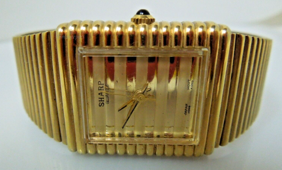 t033 Sharp Japan Movement Gold tone Quartz Watch
