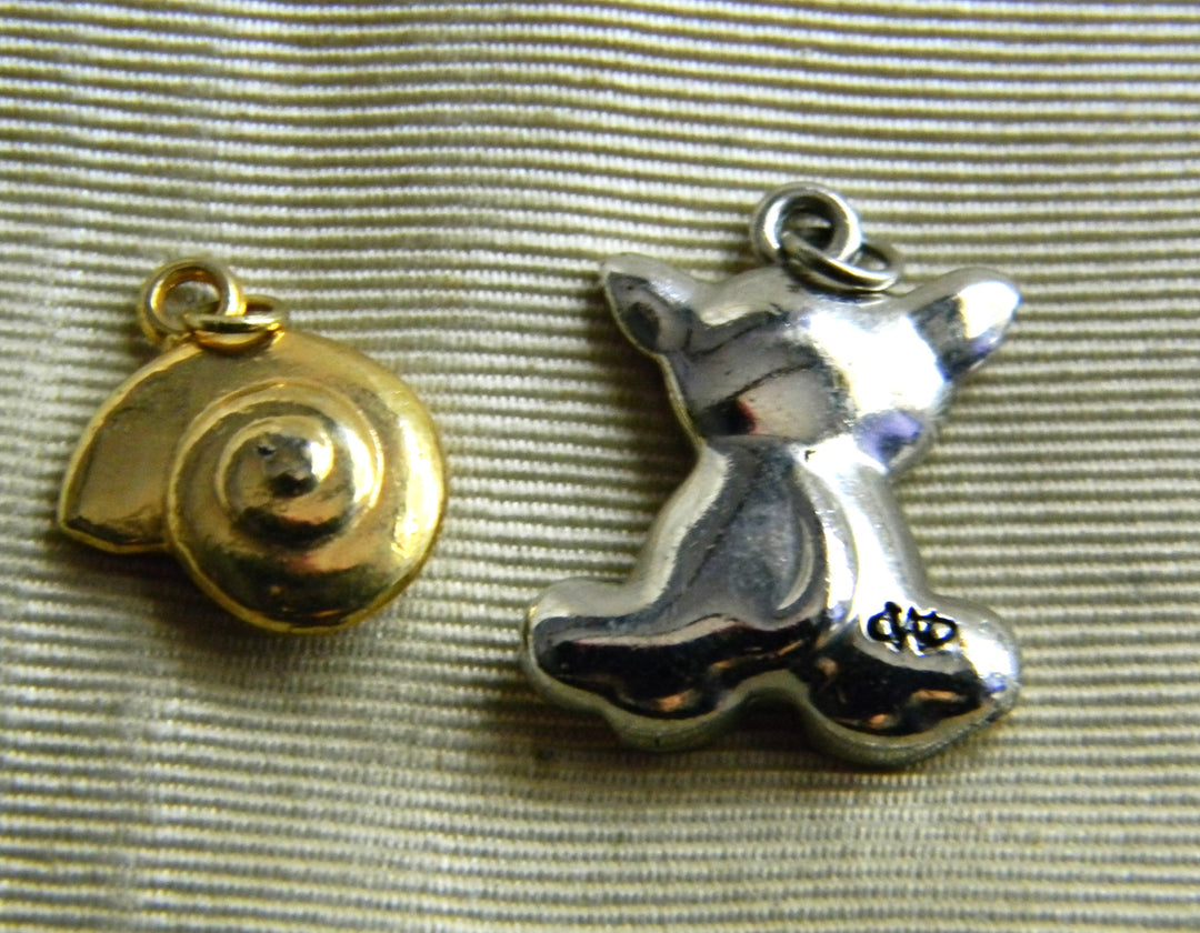 p384 Set of (2) Pendants Sold together Dog and Shell- No Chains