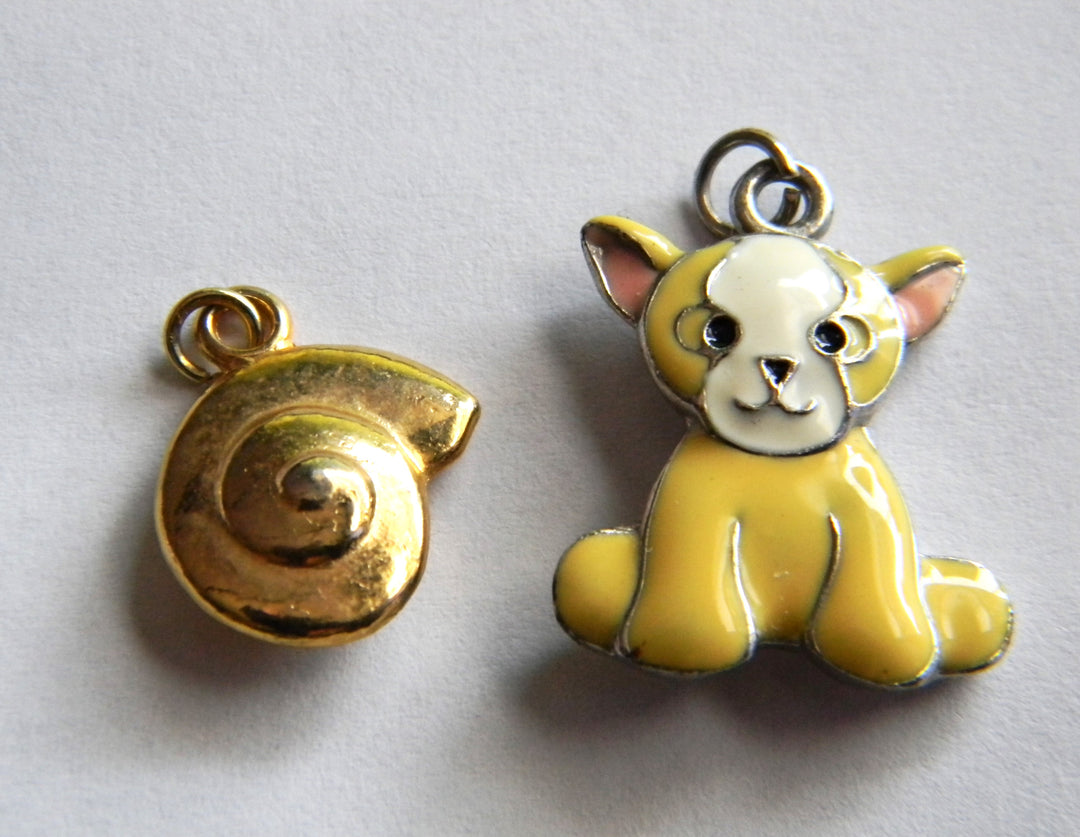 p384 Set of (2) Pendants Sold together Dog and Shell- No Chains