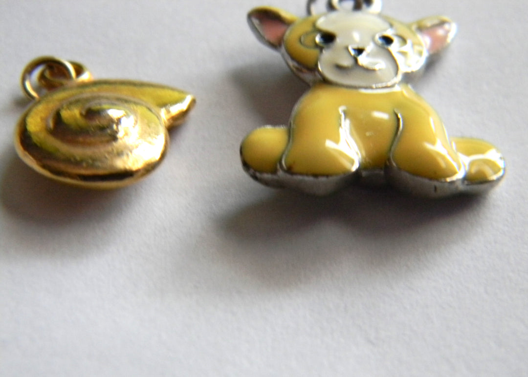 p384 Set of (2) Pendants Sold together Dog and Shell- No Chains