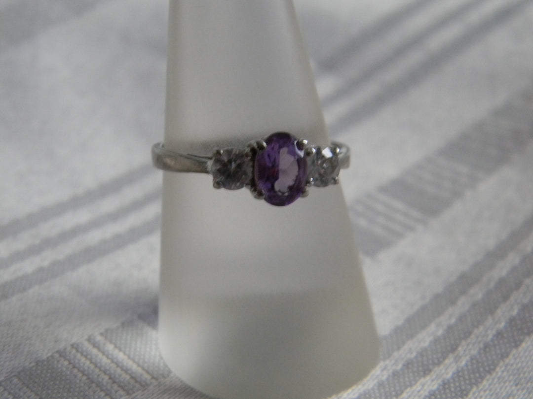 p410 Beautiful Sterling Silver Ring with Oval Purple Stone and CZ