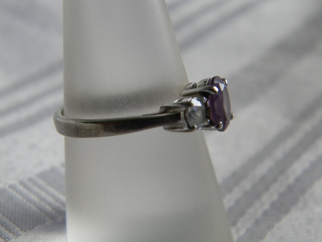 p410 Beautiful Sterling Silver Ring with Oval Purple Stone and CZ