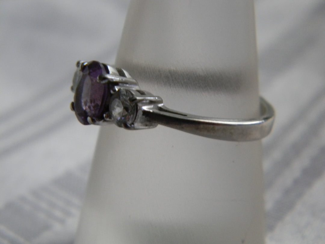 p410 Beautiful Sterling Silver Ring with Oval Purple Stone and CZ