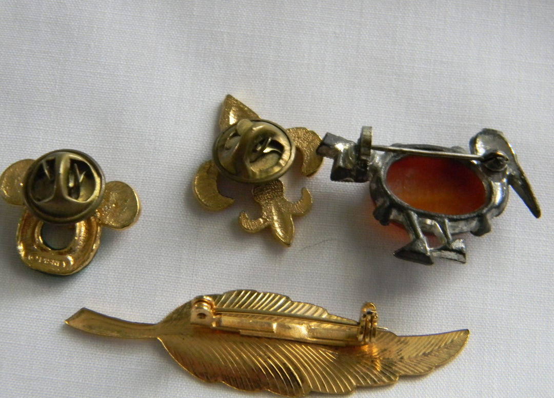 p425 Lot of 4 Pins, Mouse Ears Wreath, Gold tone Leaf, Fluer De Lis and Bird Pin