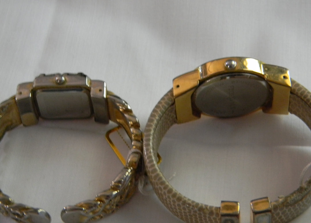 p441 Lot of two Ladies Quartz Bangle Bracelet Watches Geneva