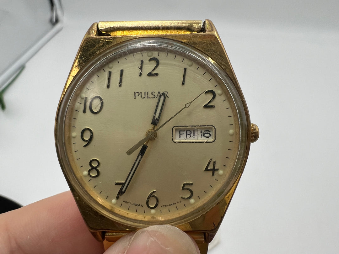 u205 Pulsar Day Date Gold Tone Quartz Wrist Watch