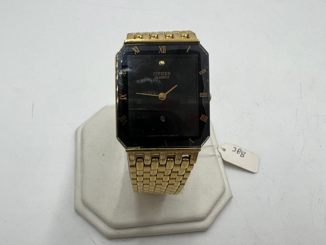 u206 Citizen Quartz Black Dial w/ Gold Tone Watch