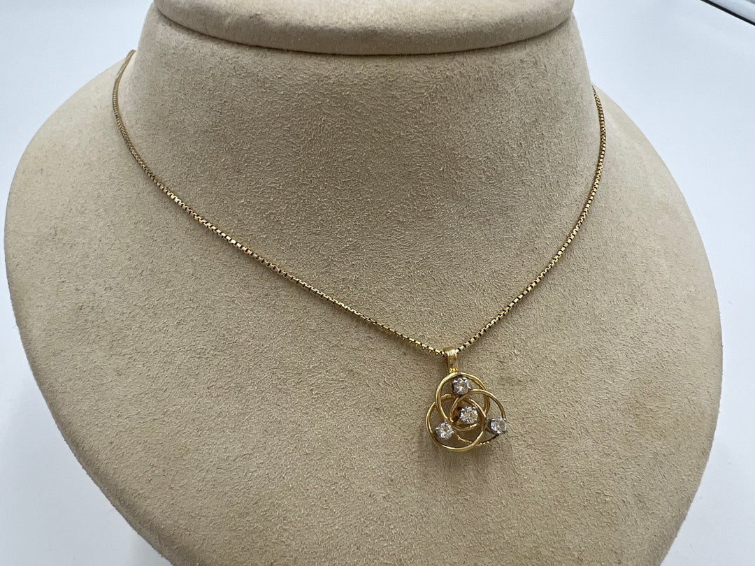 t688 Intricate 14kt Gold and Diamond Love Knot Necklace