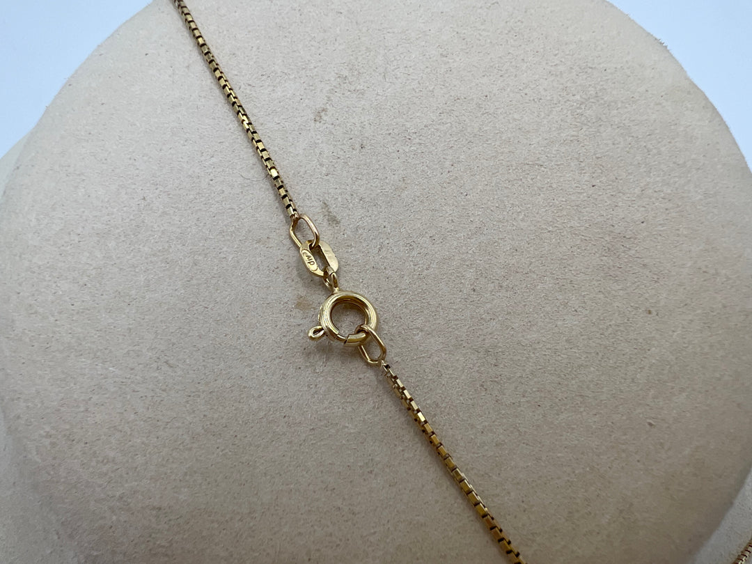 t688 Intricate 14kt Gold and Diamond Love Knot Necklace