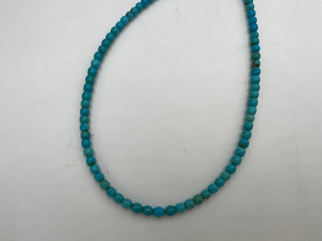 t751 Elegant Sterling Silver and Synthetic Turquoise Necklace