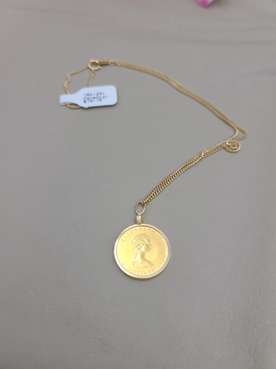 k835 Ladies 18kt Yellow Gold 16" Link Chain and 24kt 1986 Canadian Coin Pendant