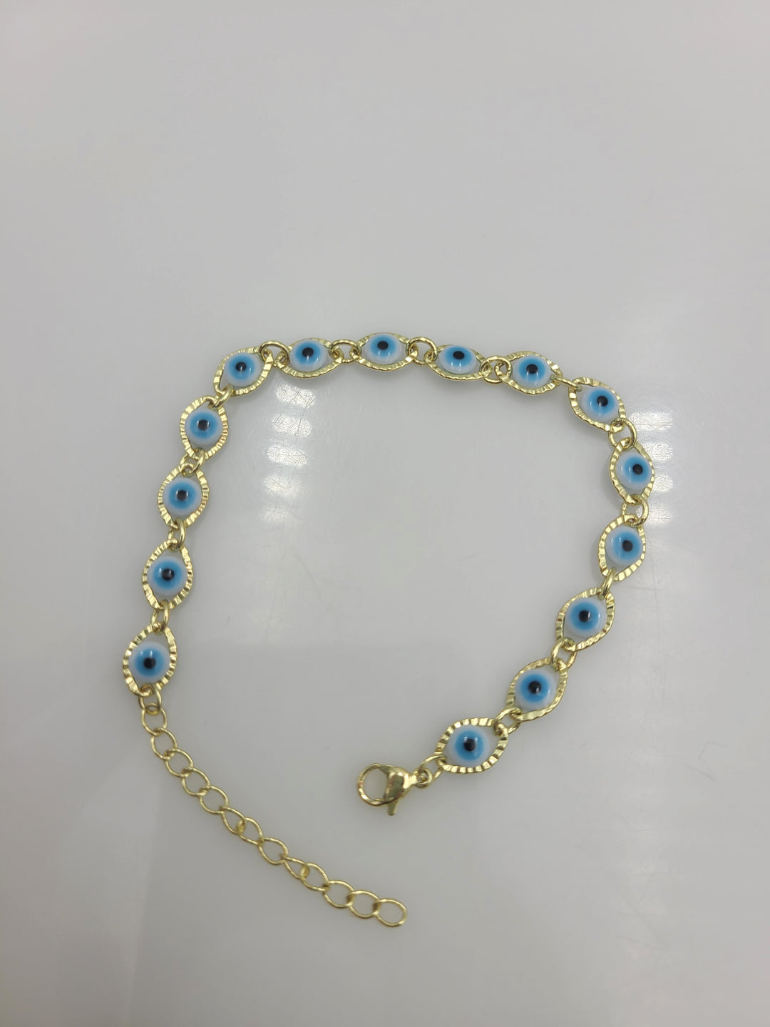 p449 Gold Tone Blue Evil Eye Luck Bracelet