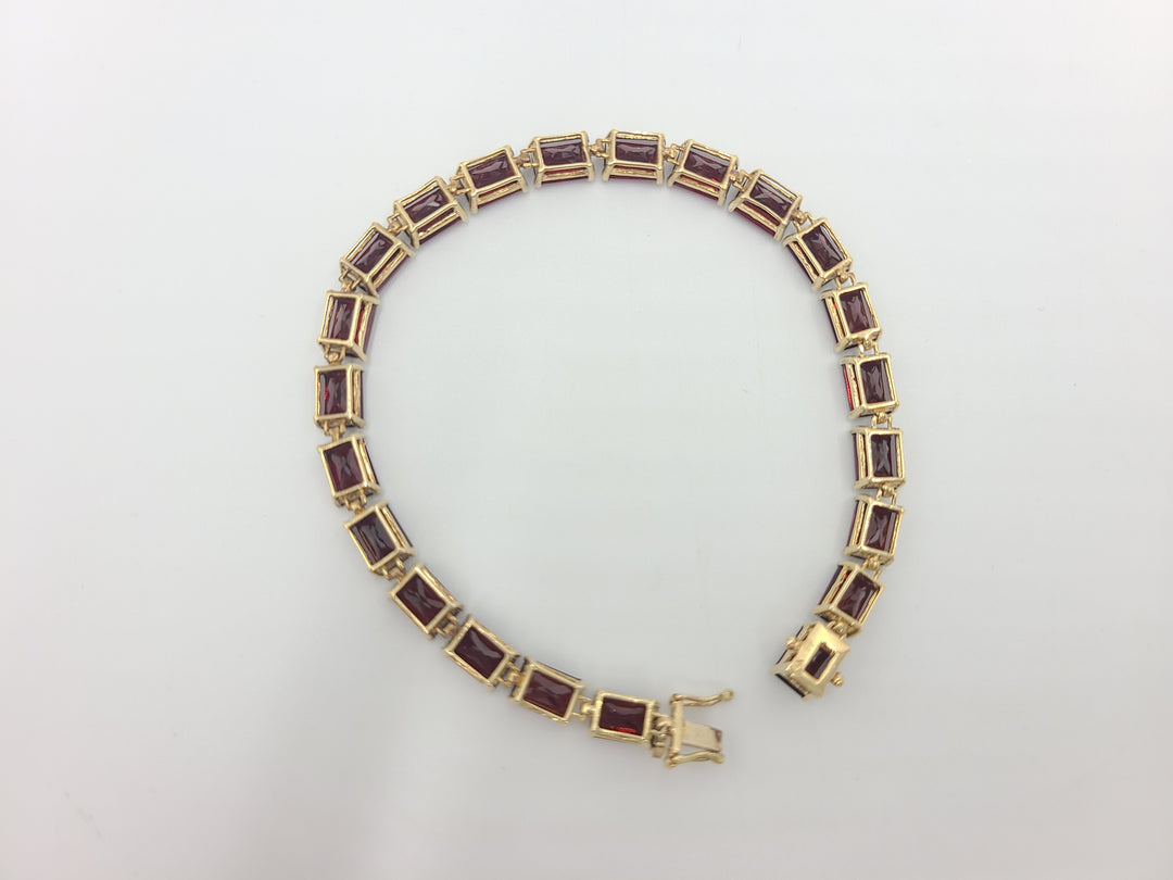 k775 Lovely Lady's 7 1/8" Garnet Bracelet in 14kt Yellow Gold