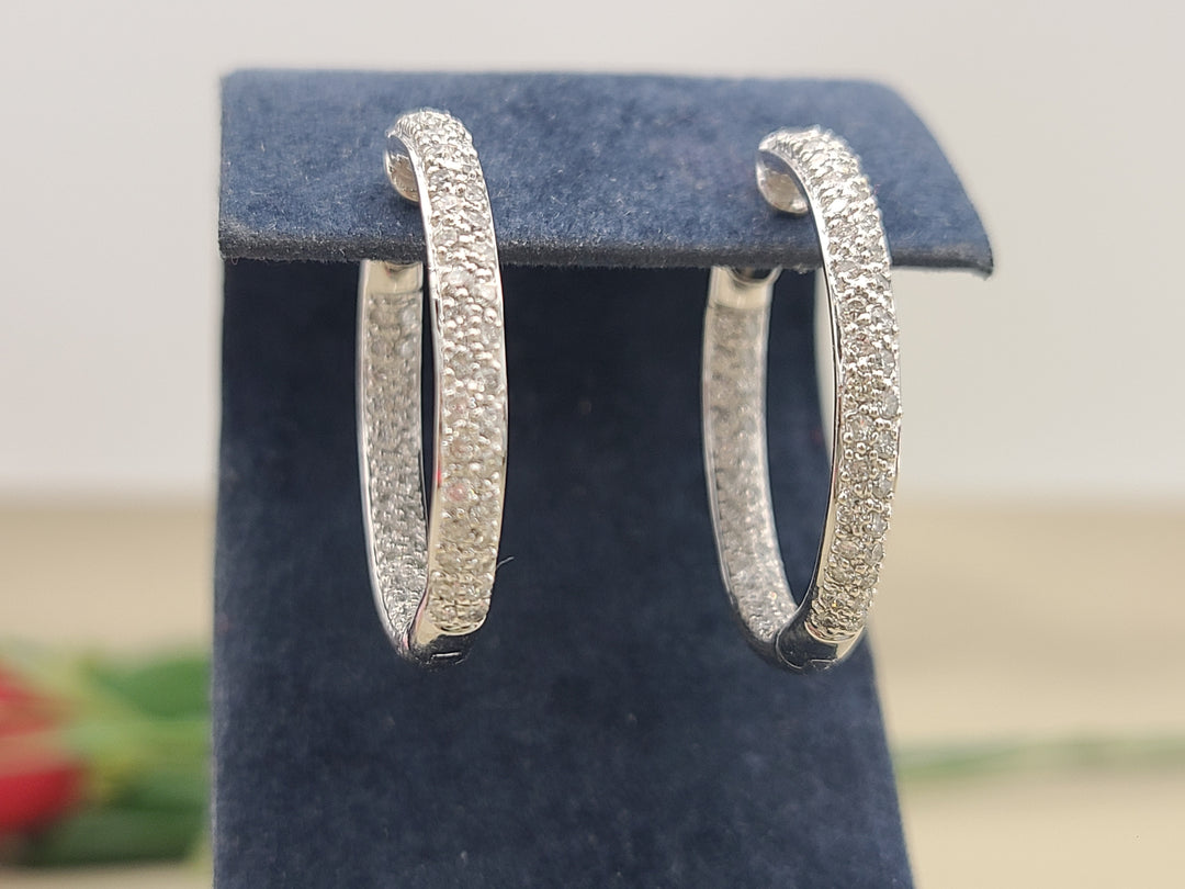 k910 Lovely Ladies 18kt White Gold Diamond In and Out Hoop Earrings