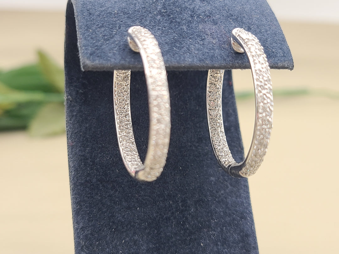 k910 Lovely Ladies 18kt White Gold Diamond In and Out Hoop Earrings