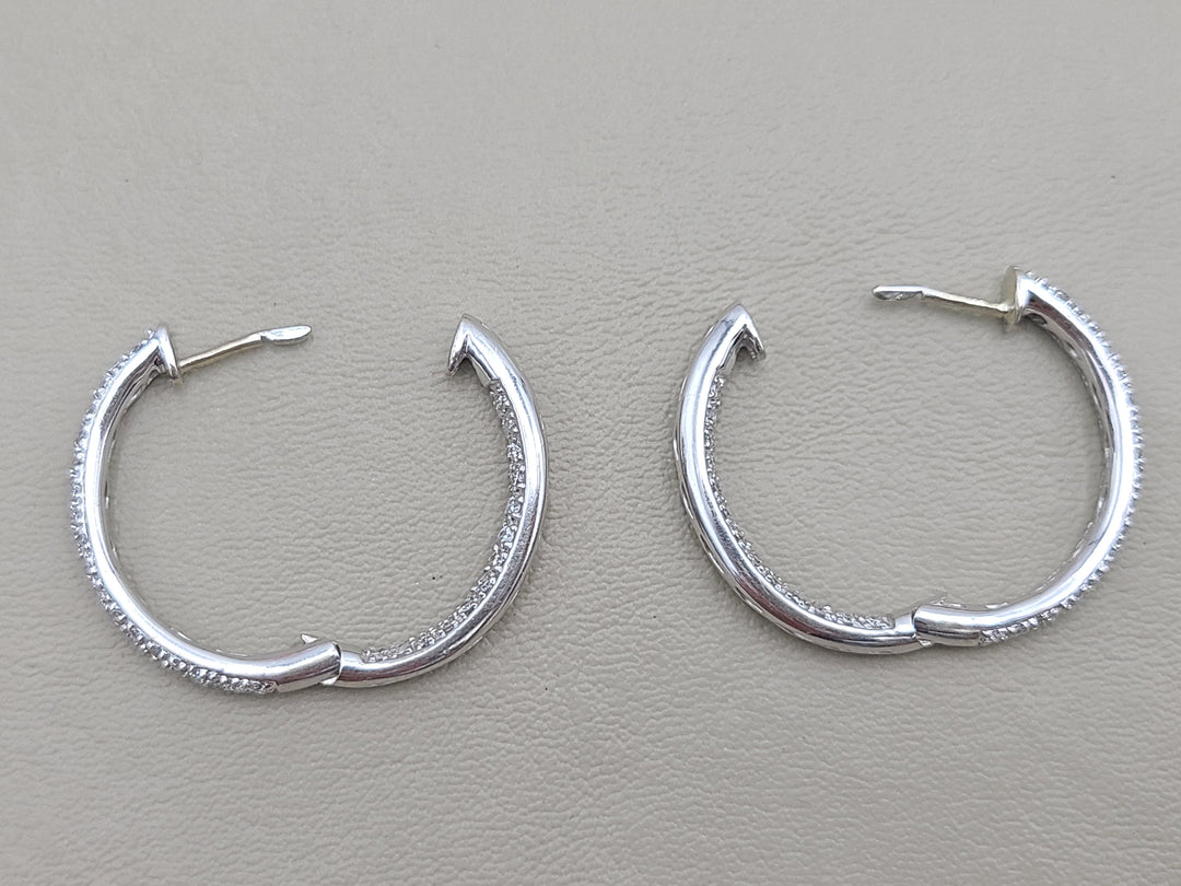 k910 Lovely Ladies 18kt White Gold Diamond In and Out Hoop Earrings