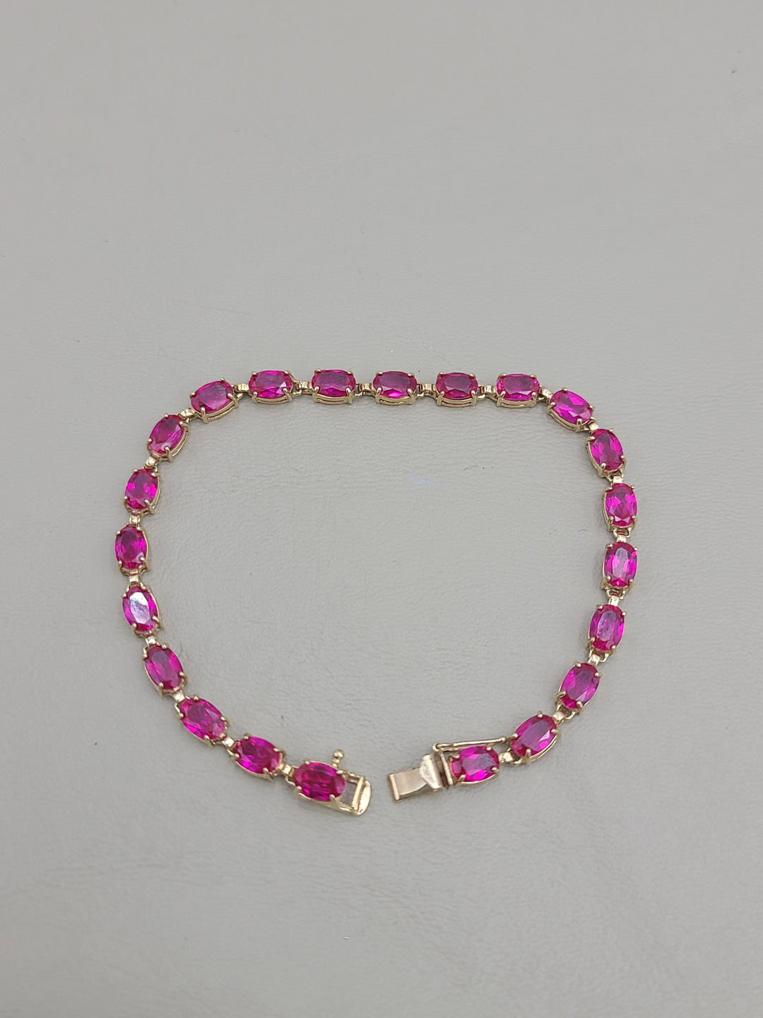 k850 Ladies Vibrant 10kt Yellow Gold Rubellite Tennis Bracelet