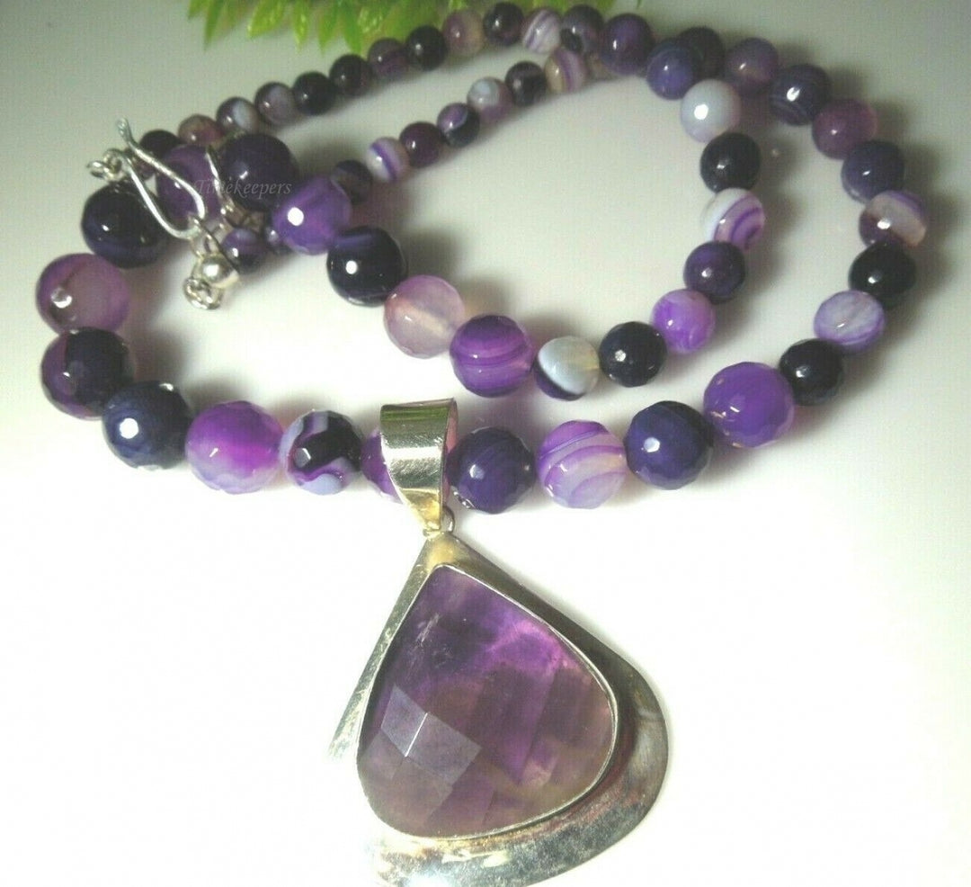 q431 Beautiful Purple Graduated Beaded Necklace with Amethyst Pendant and Sterling Silver Clasp