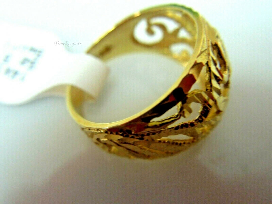 q563 Gorgeous 14kt Yellow Gold Swirl Ring Size 5 (USA)