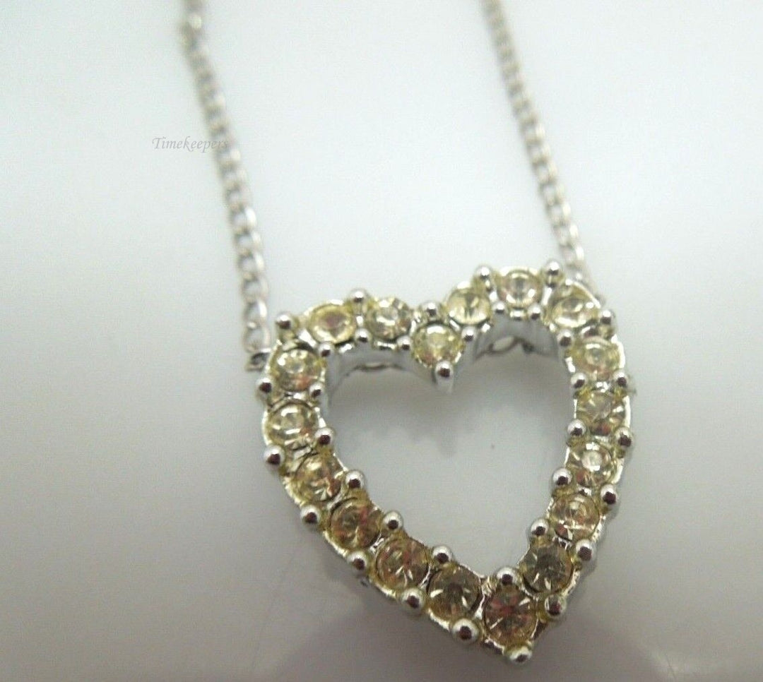 r374 Silvertone Cubic Zirconia Open Heart Pendant and Chain 15"