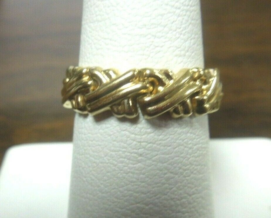 q666 14kt Yellow Gold Flexible X Ring SIze 7.25(USA)