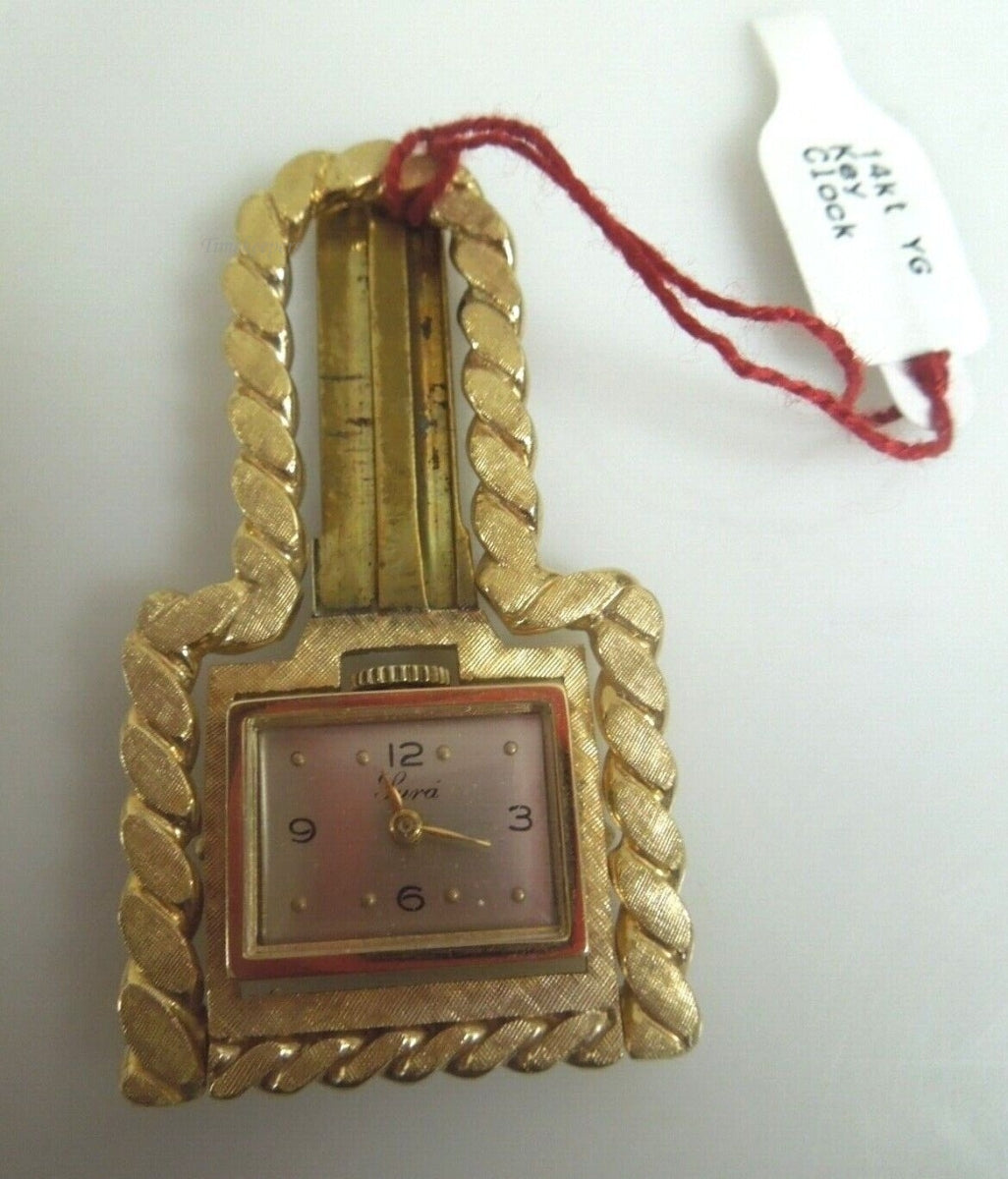 r234 14kt Yellow Gold Key Shaped Watch Unique Signed .85g