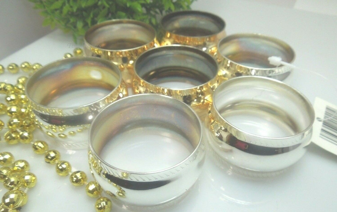 q528 Set of 7 Stainless Steel Napkin Holder Ring ( 4 Rings in Silver Tone and 3 Rings in Gold Tone)