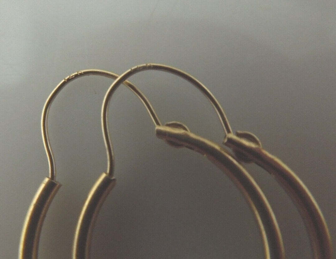 r551 14kt Yellow Gold Small Hoop Earrings Signed