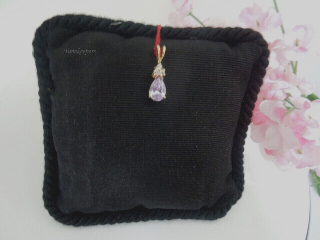 r935 10kt Yellow Gold Cubic Zirconia & Purple Stone Pendant 