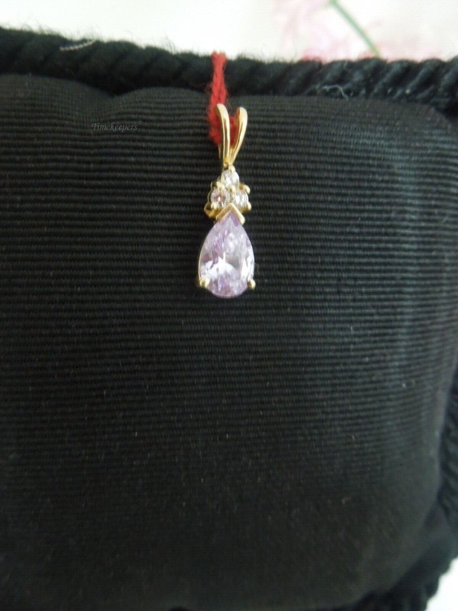 r935 10kt Yellow Gold Cubic Zirconia & Purple Stone Pendant 