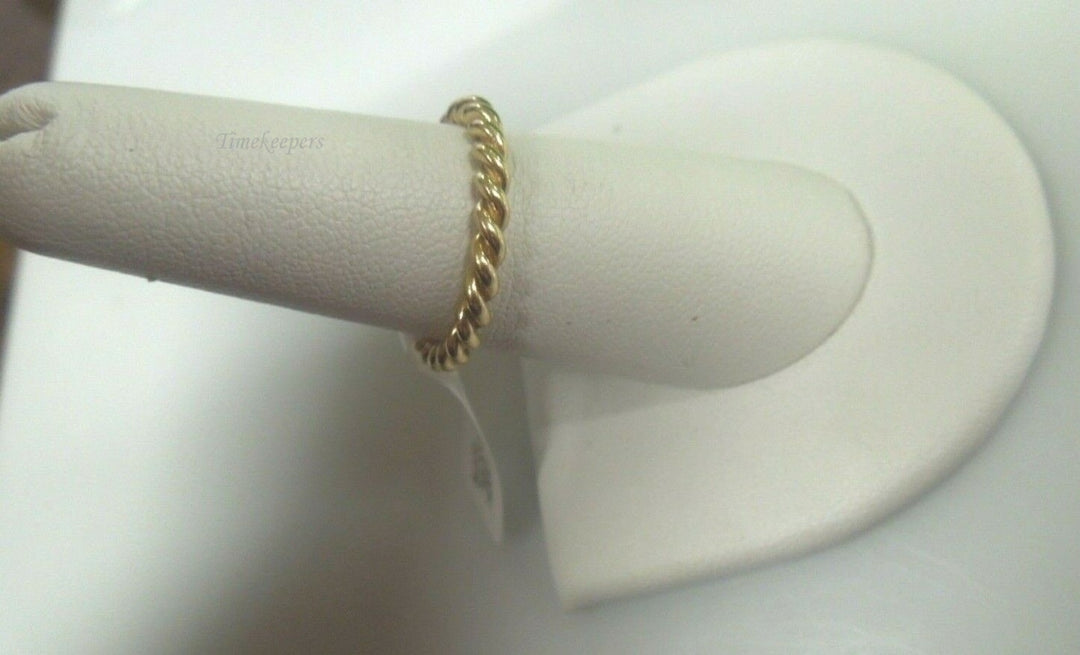 q711 14kt Yellow Gold Twisted Ring Size 7 (USA) 3.1g