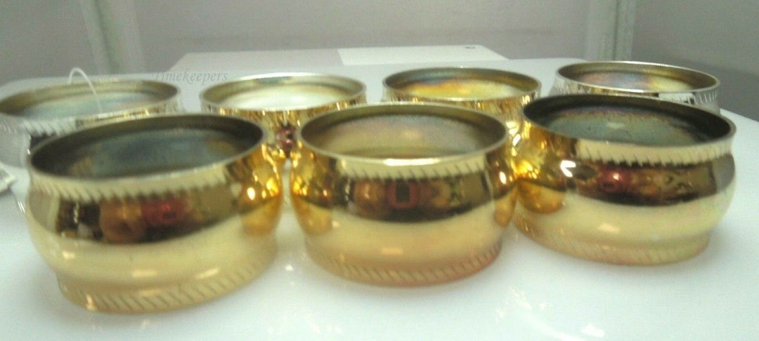 q528 Set of 7 Stainless Steel Napkin Holder Ring ( 4 Rings in Silver Tone and 3 Rings in Gold Tone)