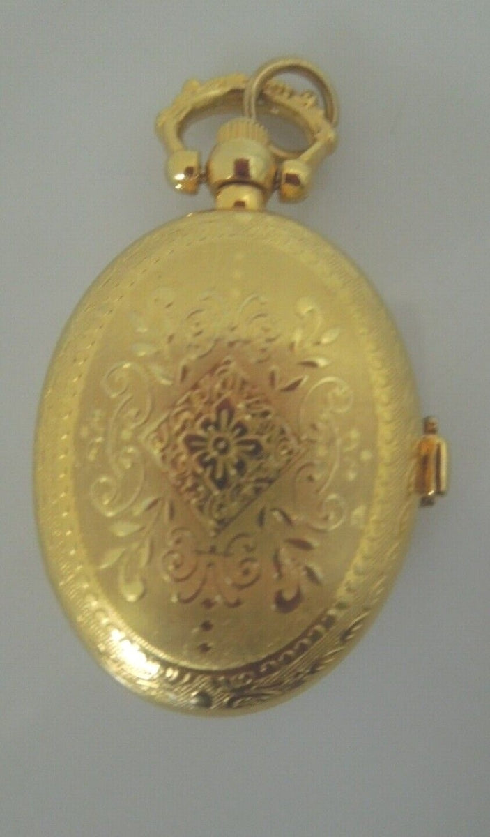 r867 Vintage Oval Etched Quartz Clock Gold tone Pendant Rare