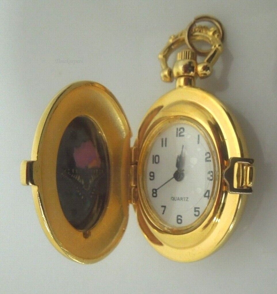 r867 Vintage Oval Etched Quartz Clock Gold tone Pendant Rare