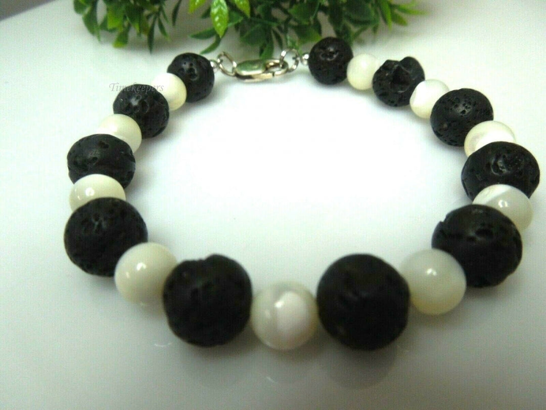 q600 Genuine Natural Black Earthminded Lava Lucky Stone with Sterling Silver Closure Bracelet Size 7"