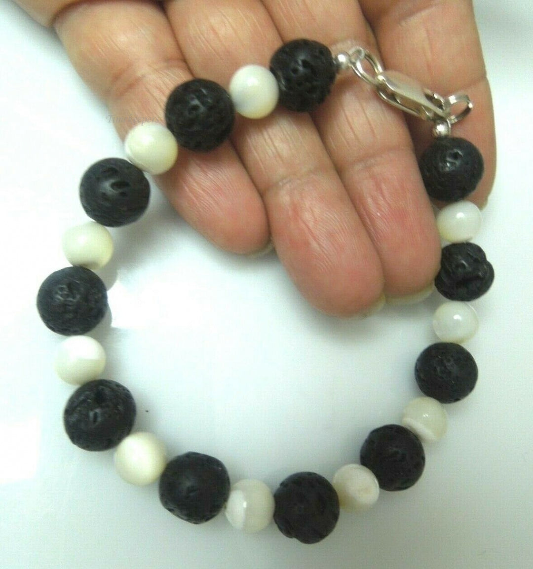 q600 Genuine Natural Black Earthminded Lava Lucky Stone with Sterling Silver Closure Bracelet Size 7"