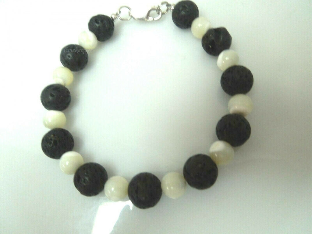 q600 Genuine Natural Black Earthminded Lava Lucky Stone with Sterling Silver Closure Bracelet Size 7"