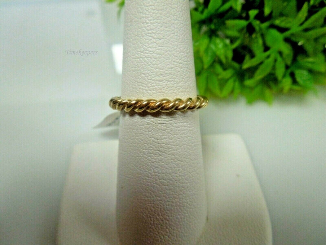 q711 14kt Yellow Gold Twisted Ring Size 7 (USA) 3.1g