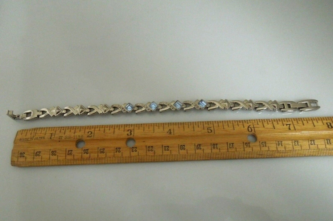 r670 Vintage 1950s Silvertone 7" Link Bracelet Faux Blue Rhinestone Tennis Bracelet