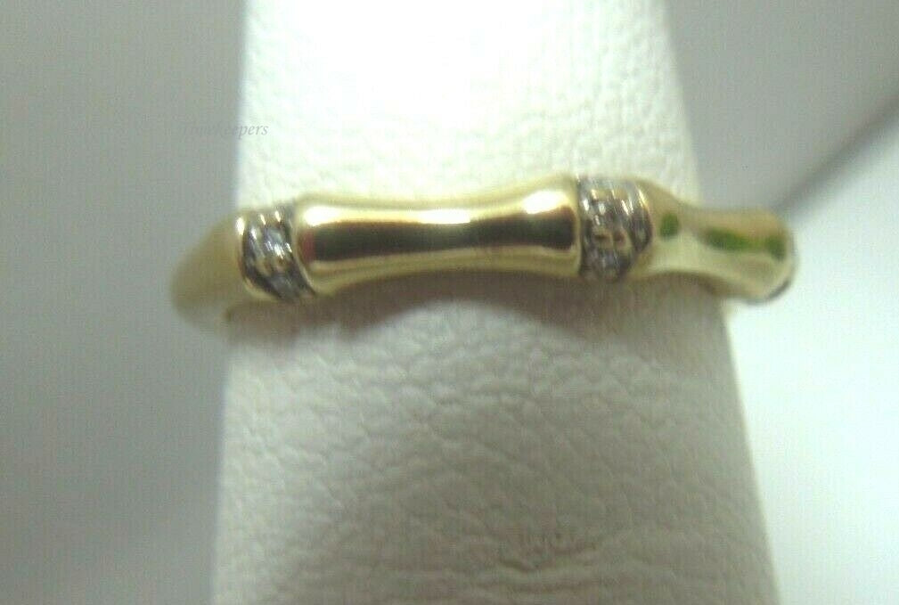 q604 Disney 9kt Yellow Gold Diamond .09 cts Size 5.25 Ring