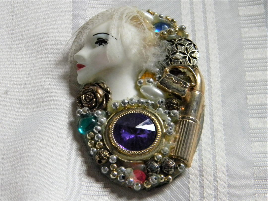 h650 Unique Collage Brooch with a Lady with Feather Hair Signed