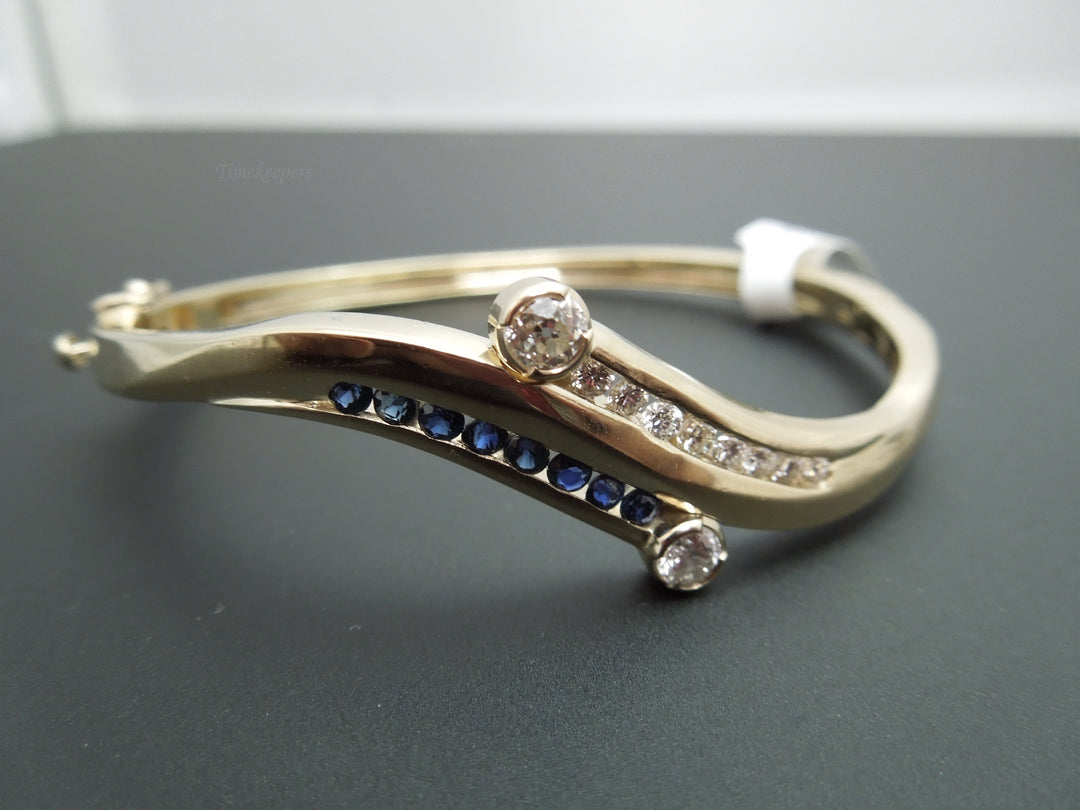 b863 Gorgeous 14kt Yellow Gold Diamond and Sapphire Bangle Bracelet