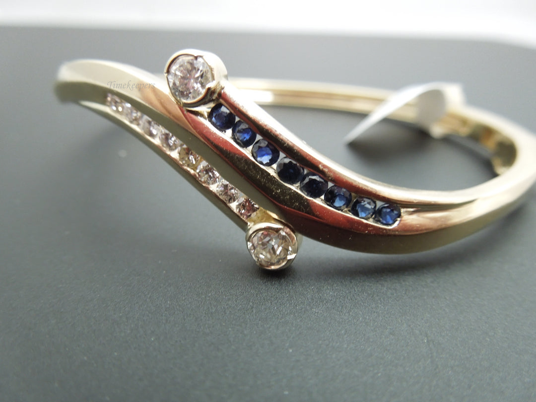 b863 Gorgeous 14kt Yellow Gold Diamond and Sapphire Bangle Bracelet